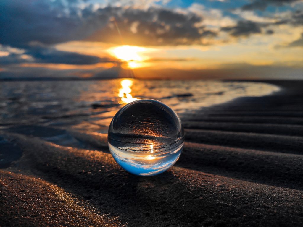 Image showing a beach at sunset with the copy underneath: Meditation: the practice of focusing your mind