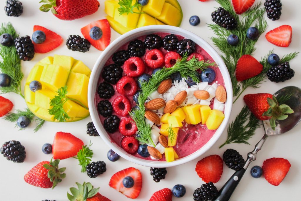 Image depicting a bowl of acai with fruit and nuts - the perfect food to fight depression.