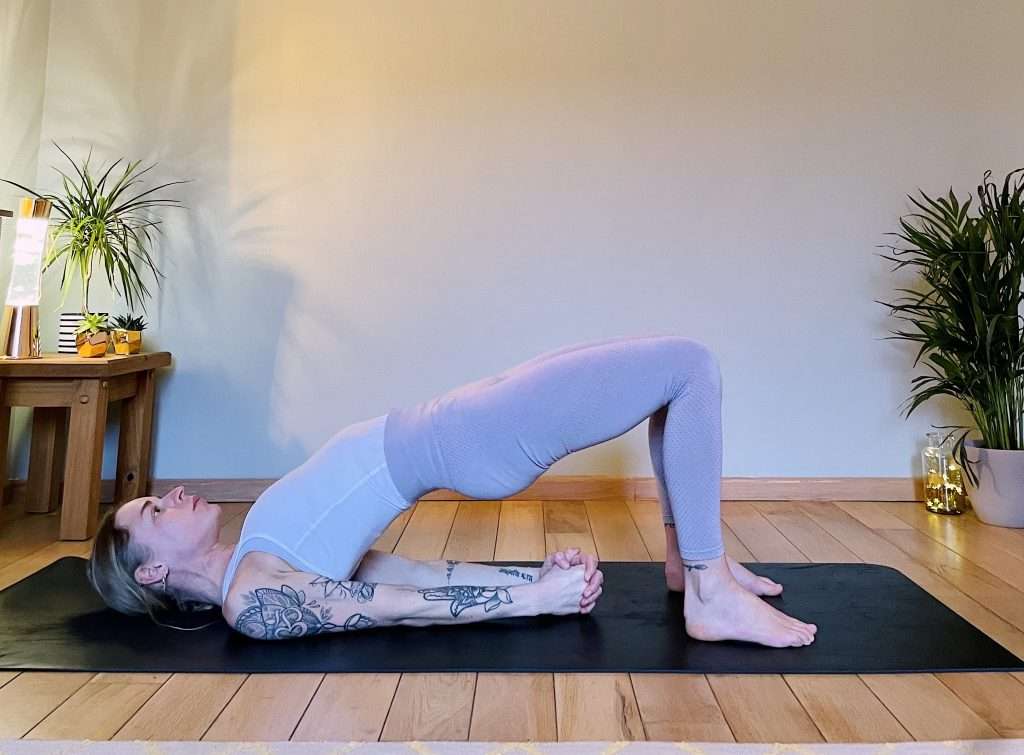 Girl practicing three variations of a yoga backbend for 3 levels. Offering modifications and variations is important when sequencing yoga classes and planning ahead. 